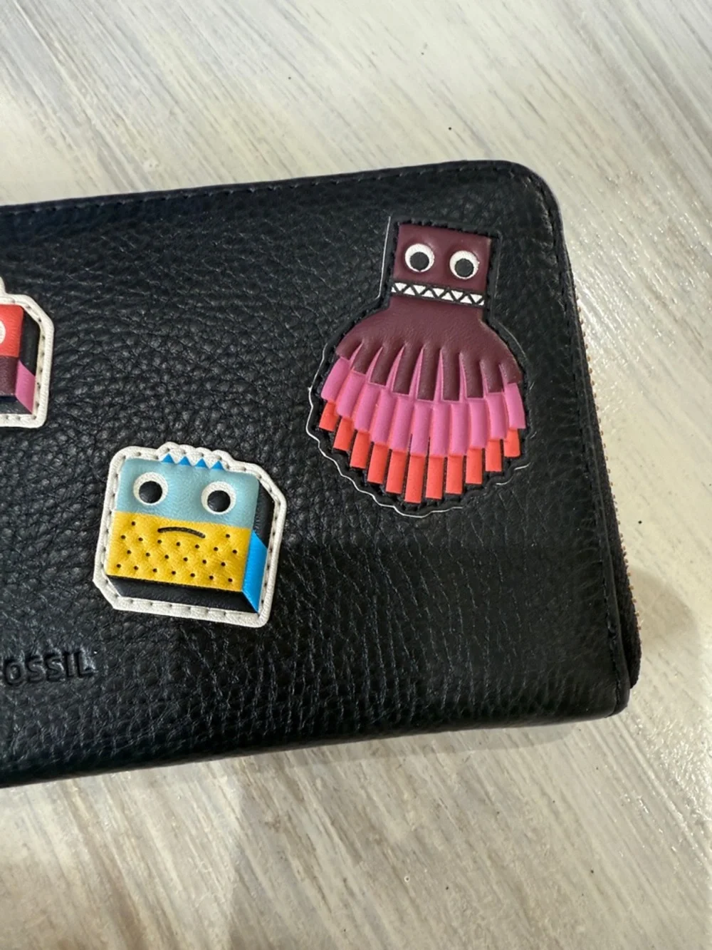 Rare Fossil Emma Black Zip-Around Wristlet with Colorful Robot Appliqués